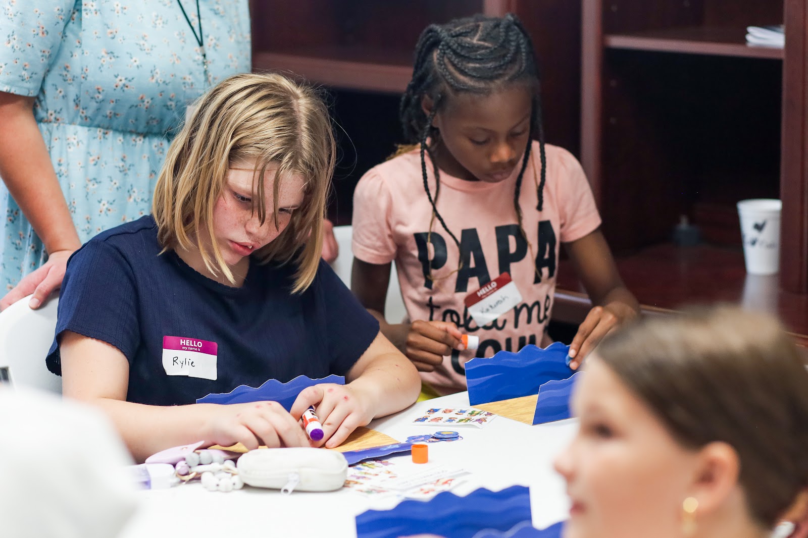 Kids doing a craft together at Haven Kids Club